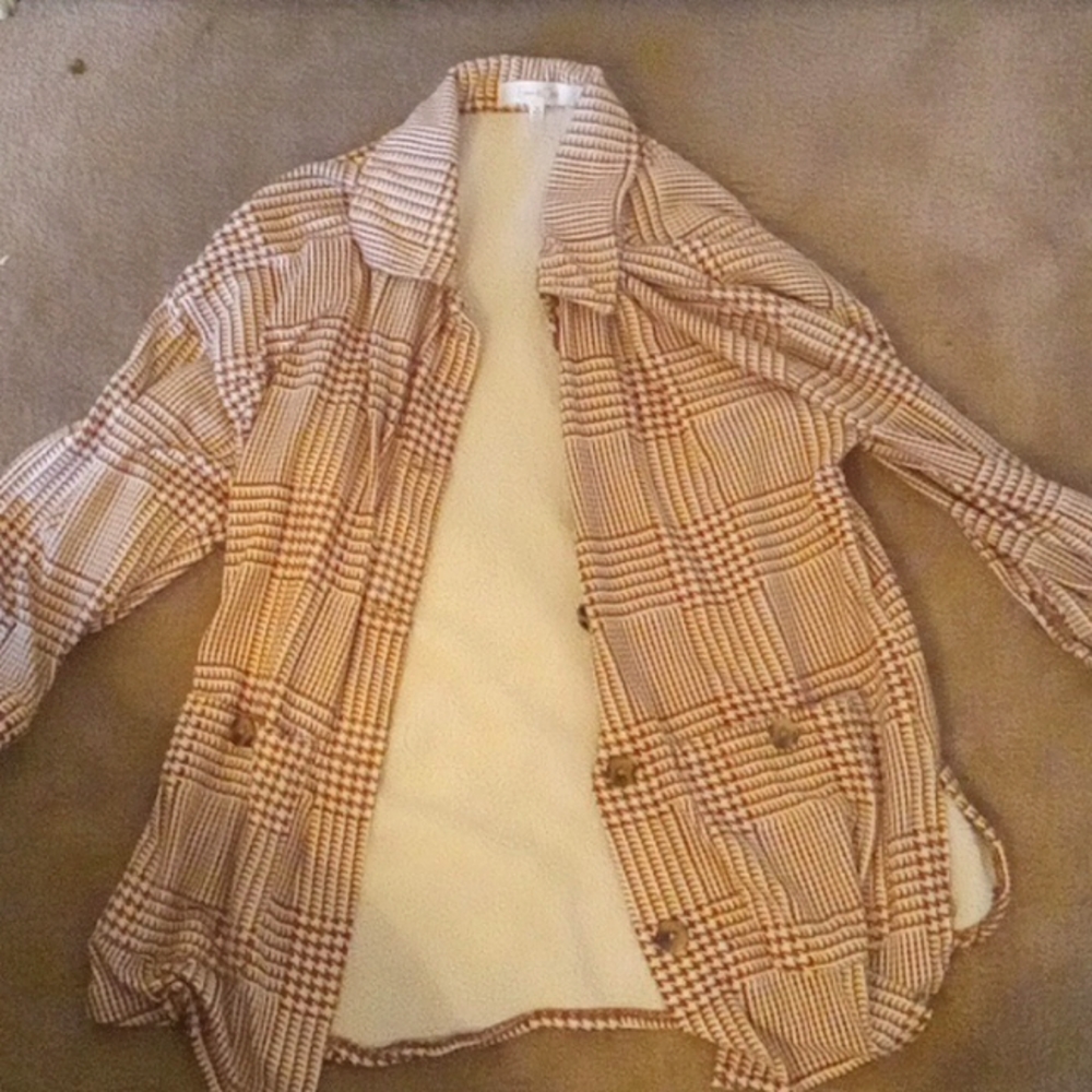 A brown and creme jacket